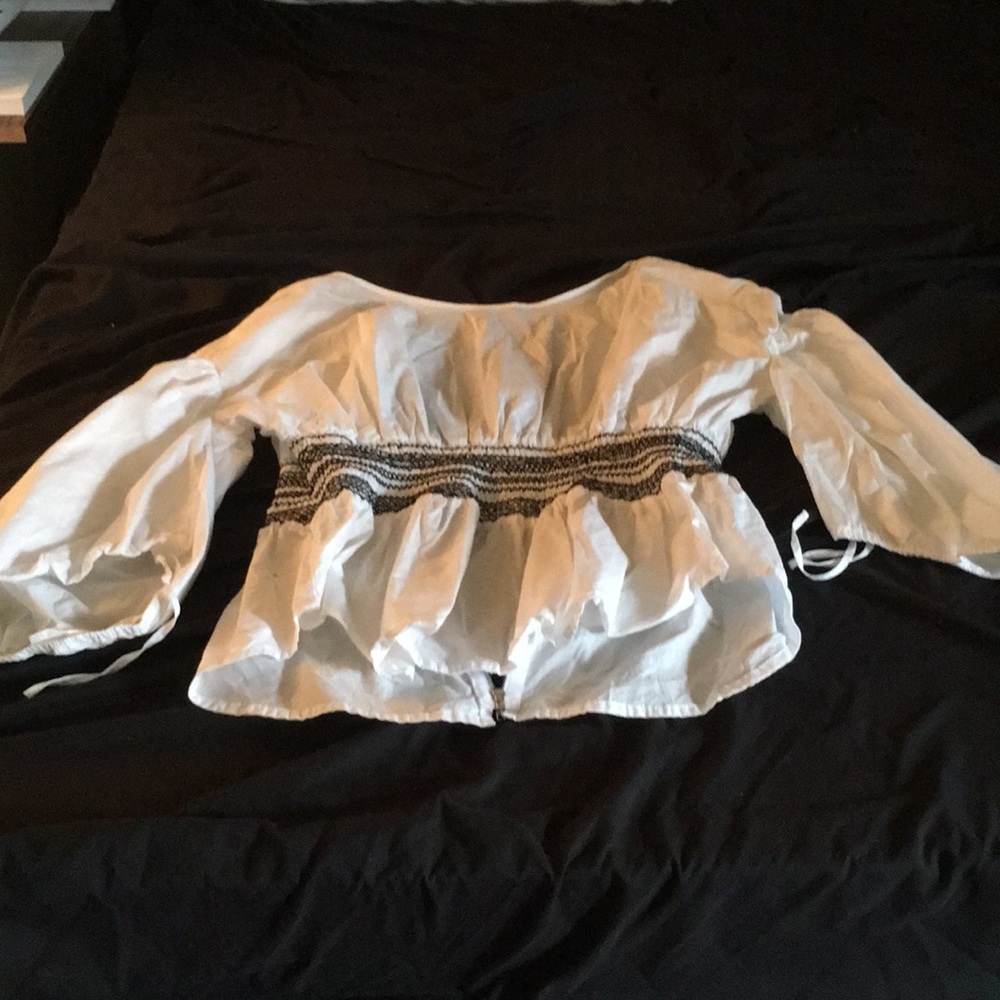 White bell sleeve top